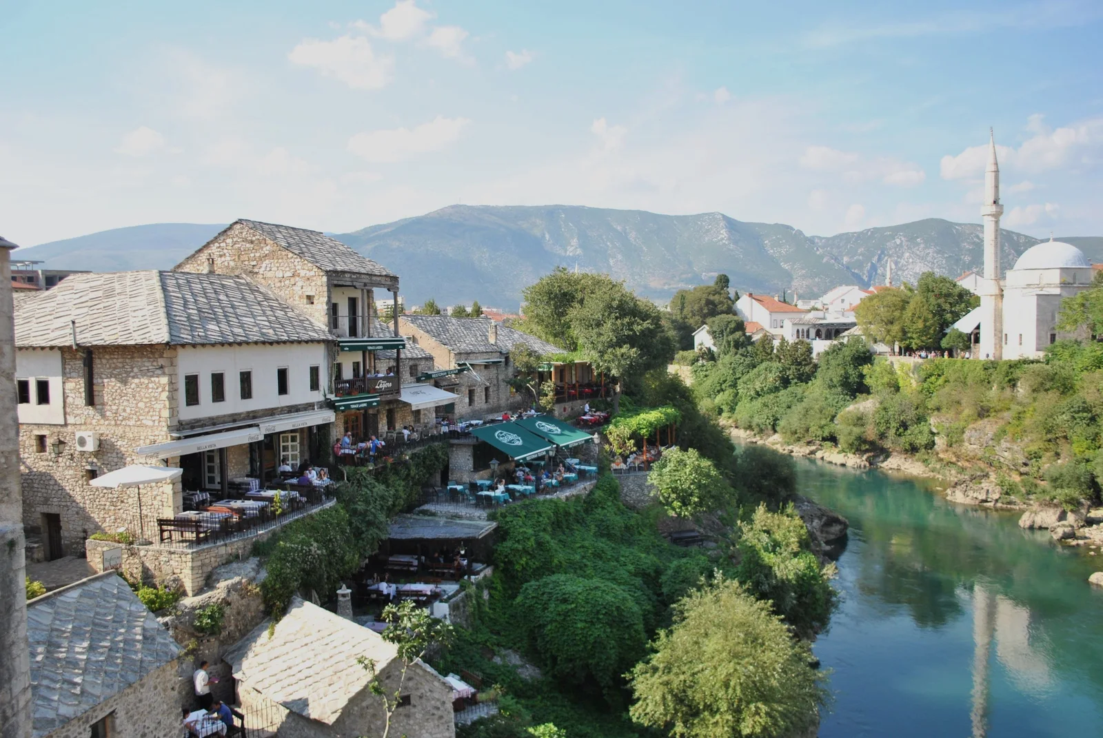Scenic view of traditional stone houses and Neretva river in Mostar, Bosnia.