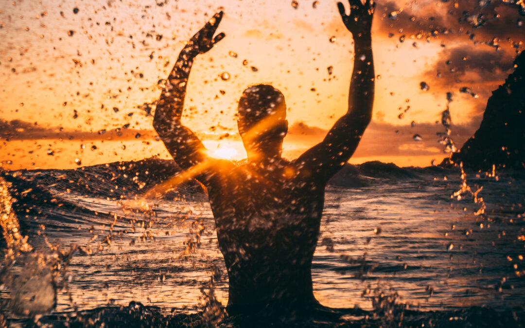 Silhouette photography of man at beach during sunset